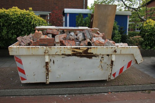 Enclosed and lockable skip placed in a residential area of Putney