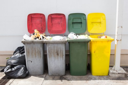 Construction site with waste segregation containers in Putney